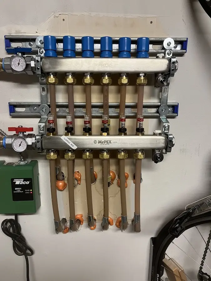 Plumber performing Water Heater Repair at a residential property in Orrington